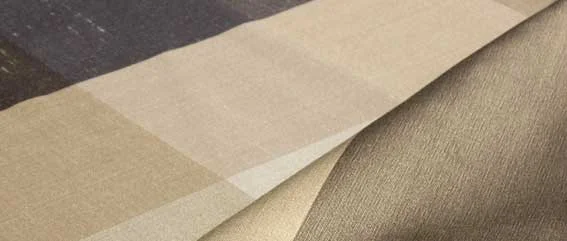 tecido com quadriculados em tons de bege, dourado e preto